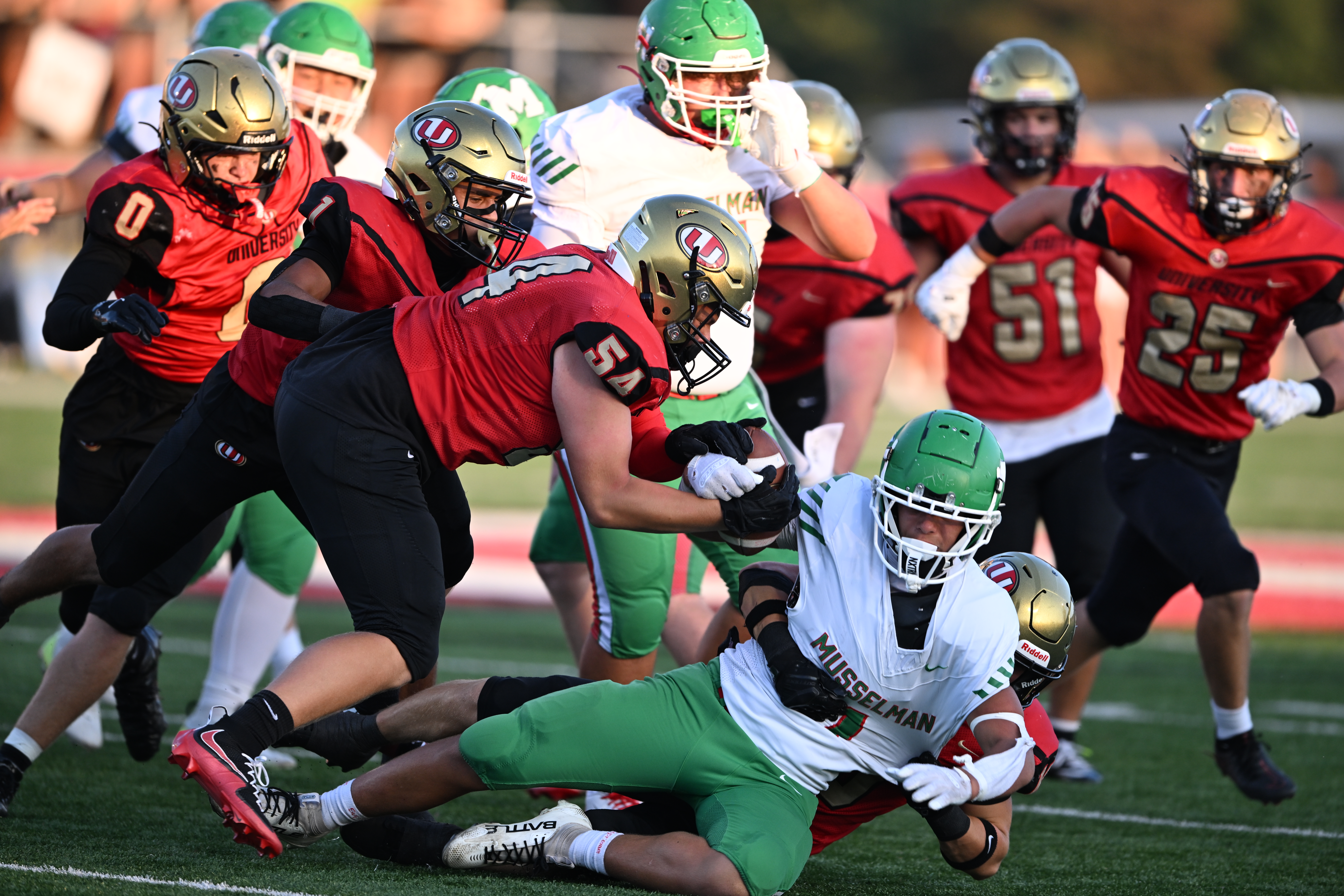 University High efficient, delibrate in all-around 35-3 victory over Musselman to open 2026